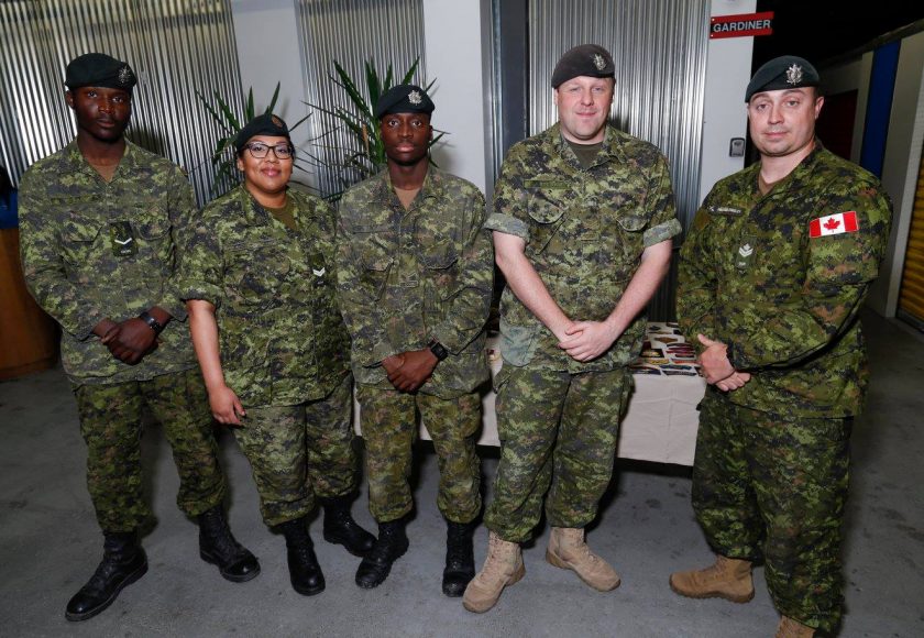 Queen's Own Rifles of Canada March, five people in green uniform standing